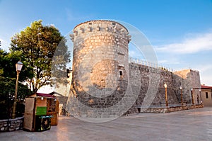 Frankopan fortress tower walls and little wooden shop at Krk - C