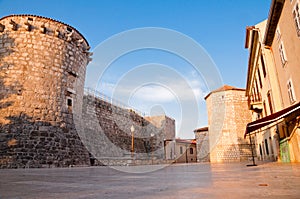 Frankopan fortress tower and walls from square ground level at K