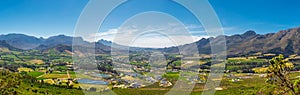 Franschhoek valley panorama with its famous wineries and surrounding mountains