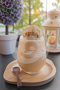 frappe mocha with ice cream in glass at coffee cafe photo