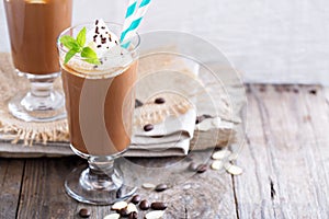 Frappuccino in a glass with cream
