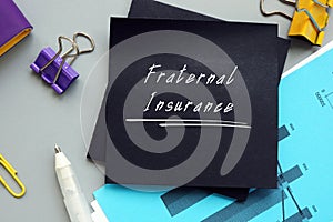 Fraternal Insurance sign on the piece of paper