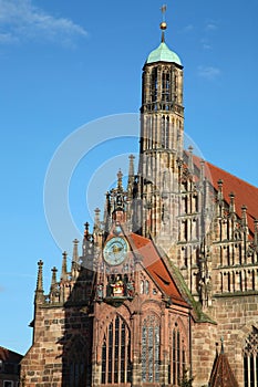Frauenkirche Church with the famous clock with moving figures Mannleinlaufen in Nuremberg, Germany photo