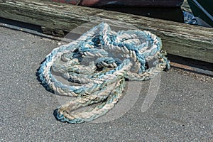 Frayed line lying on New Bedford dock