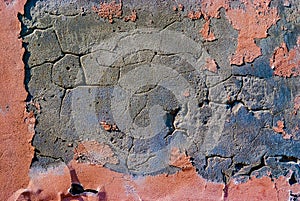 Frayed old stucco wall