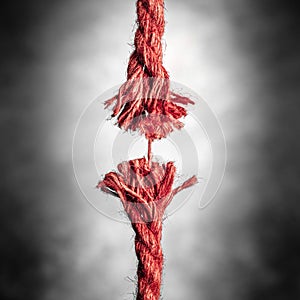 Frayed Red Rope Hanging By Last Thread