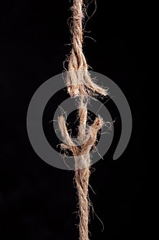 Frayed rope ready to break