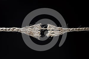 Frayed rope about to break background photo