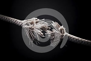 Fraying rope. Conceptual image