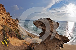 Freakish rocks on coast of Mediterranean sea photo