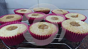 Freash baked cupcakes with caramel filling photo