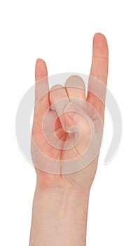 Freckled white hand. Isolated woman`s hand in a horns gesture palm up, middle and ring fingers tucked into the palm by the thumb,