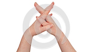 Freckled white hands make an interlaced steepled fingers gesture