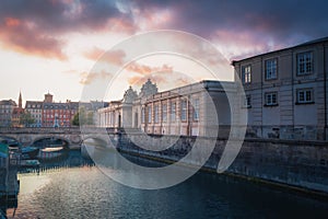 Frederikholms Canal, Marble Bridge and Christiansborg Palace Entrance at sunset - Copenhagen, Denmark