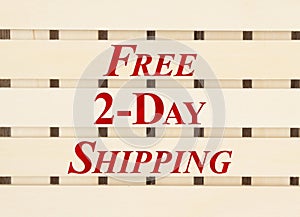 Free 2 day shipping type message on slate wood