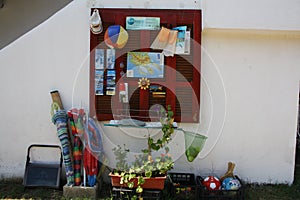 Free beach toys in yard of resort house in Sitonia, Greece. Grass, houses