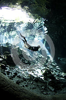 Free diver in cenote