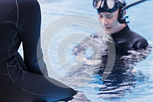 Free diving training on swimming pool