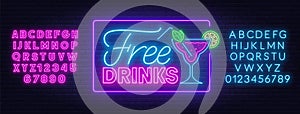 Free drinks neon sign on brick wall background.