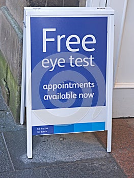 Free eye tests: sign board.