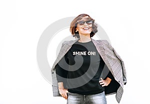 Free feeling happy smiling woman posing in black sweatshirt with