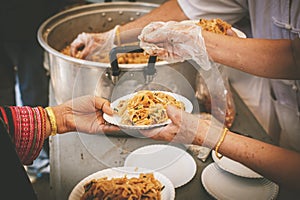 A free food kitchen that feeds hundreds of hungry poor people : problem concepts of disadvantaged people and hunger