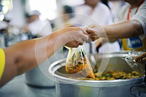 Free food for poor and homeless people donates food to food less people : Food concept of hope