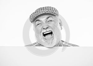 Free and happy. Copy space placate information. happy mature man in retro hat. Advertisement. Senior bearded man place