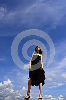 Free and happy. Joyful cute girl outdoor. Future success. Girl on blue sky. Fashion is her life. Woman with fash ion photo