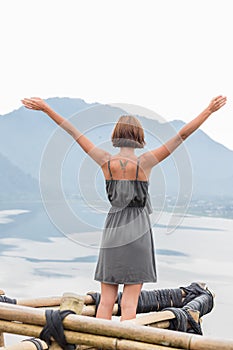 Free Happy Woman Enjoying Nature. Beauty Girl Outdoor. Freedom concept. Beauty Girl over Sky and Sun. Sunbeams