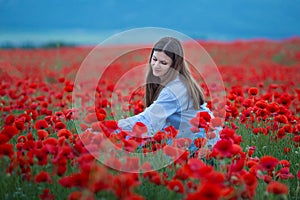 Free Happy Woman Enjoying Nature. Beauty Girl Outdoor. Freedom concept. Beauty Girl over Sky and Sun. Sunbeams. Enjoyment