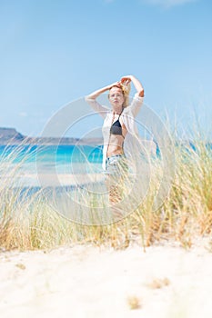 Free Happy Woman Enjoying Sun on Vacations.