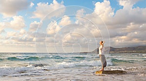 Free Happy Woman Enjoying Sunset on Sandy Beach