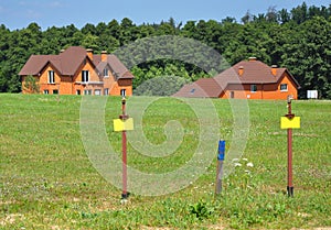 Free Land with Natural Gas Pipelines Ready for Install on the Summer Cottage Village Background.
