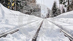 Free railway in winter time in mountains