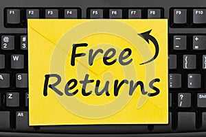 Free Returns message on an envelope on black keyboard