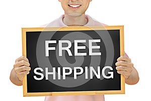 Free shipping sign on blackboard