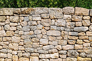 Free standing stone wall built with harvested rocsk