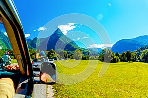 Free summer car travelling road trip in beautiful mountain landscape