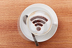 Free wifi area sign on a latte coffee