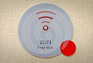 Free WiFi sign on the wall in hotel