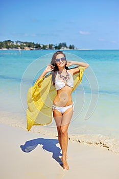 Free woman enjoying freedom feeling happy at beach