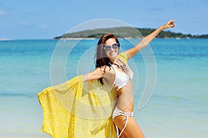 Free woman enjoying freedom feeling happy at beach