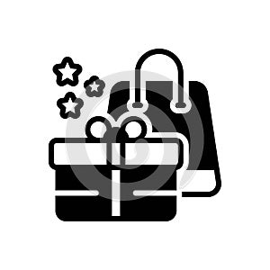 Black solid icon for Freebie, gift and package photo