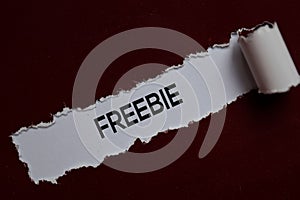 Freebie Text written in torn paper photo