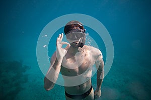 Freediver doing the Okay Sign photo