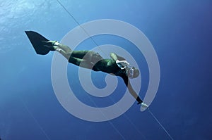 Freediver shows the OK sign photo