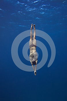 Freediver Underwater in San Andres, Colombia photo
