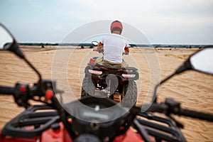 Freedom atv riding in desert, racer eyes view