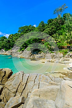 Freedom beach, Phuket, Thailand - Tropical island with white paradise sand beach and turquoise clear water and granite stones